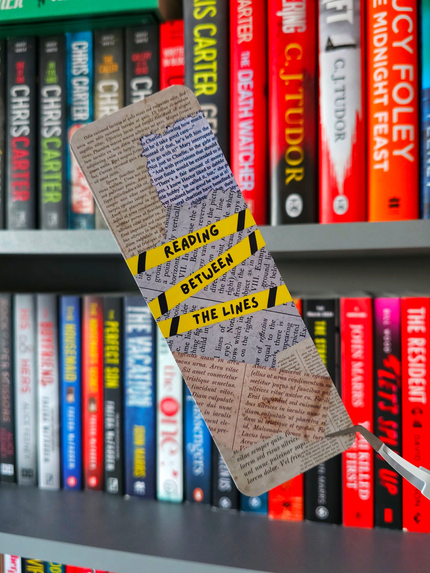 Reading Between The Lines Bookmark