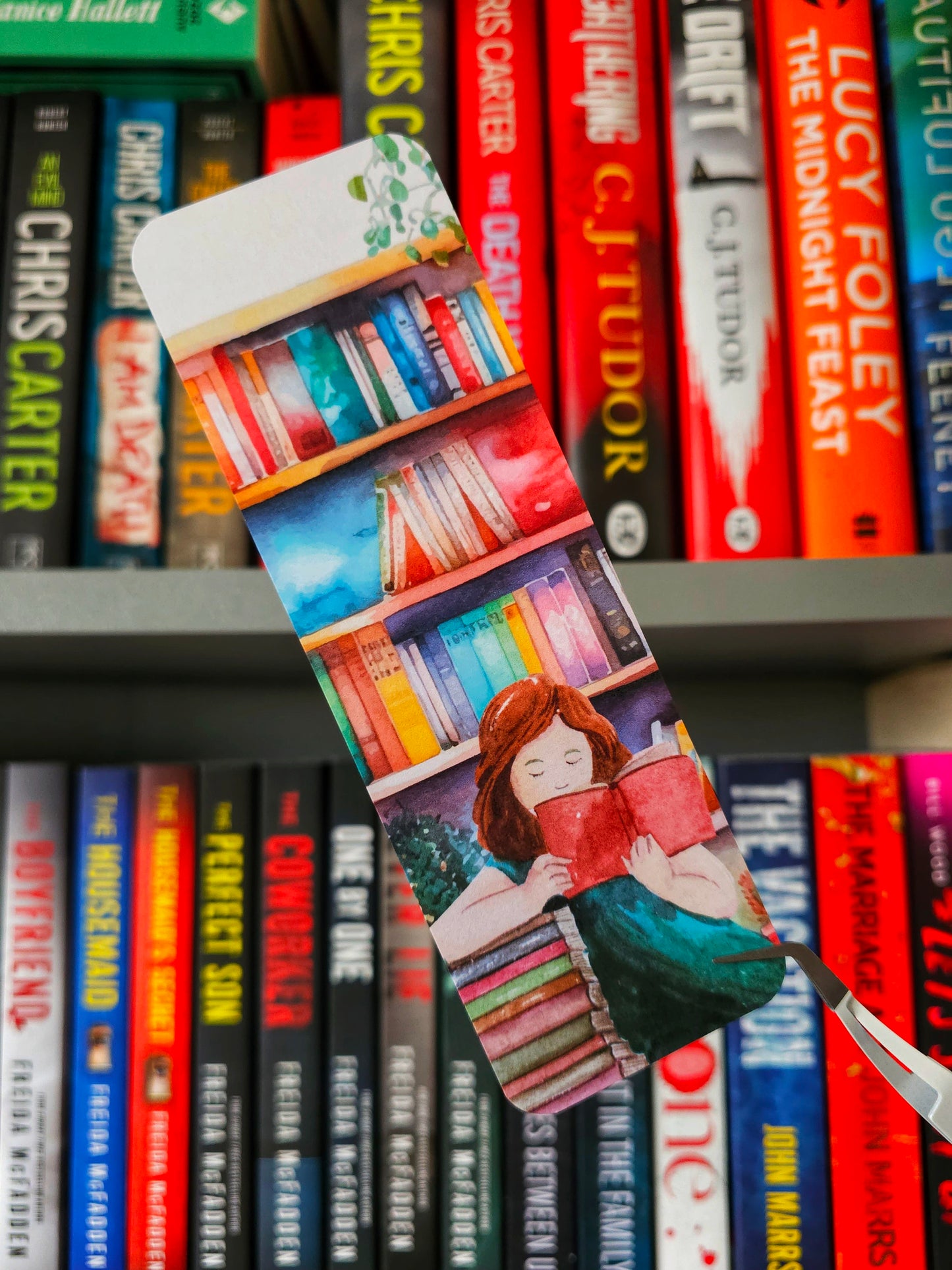 Reading By The Bookshelf Bookmark